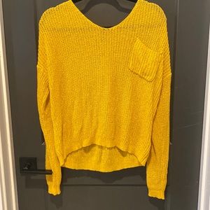 Yellow sweater, woman’s size M/L.